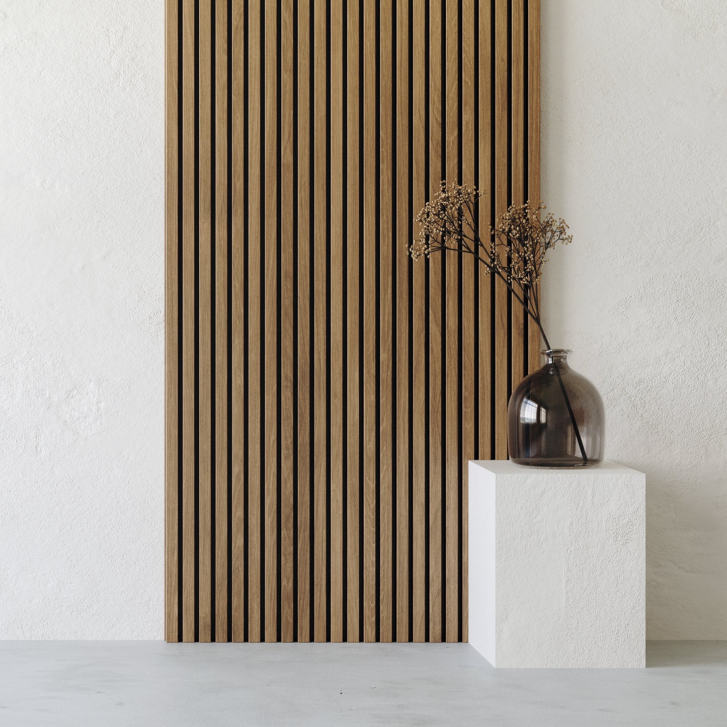 A glass vase with dried branches sits on a white pedestal in front of Landmark Decor's Exterior Wall Panel Keel, set against a white textured background.