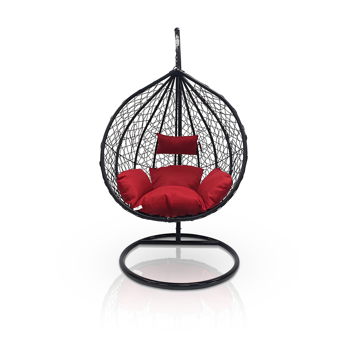 The Chelo Outdoor Swing Chair - Black by Landmark Decor is a luxurious black rattan swing chair with a stand, featuring bright red cushions and pillow. Its innovative woven pattern offers a cozy and stylish look against the plain white background.