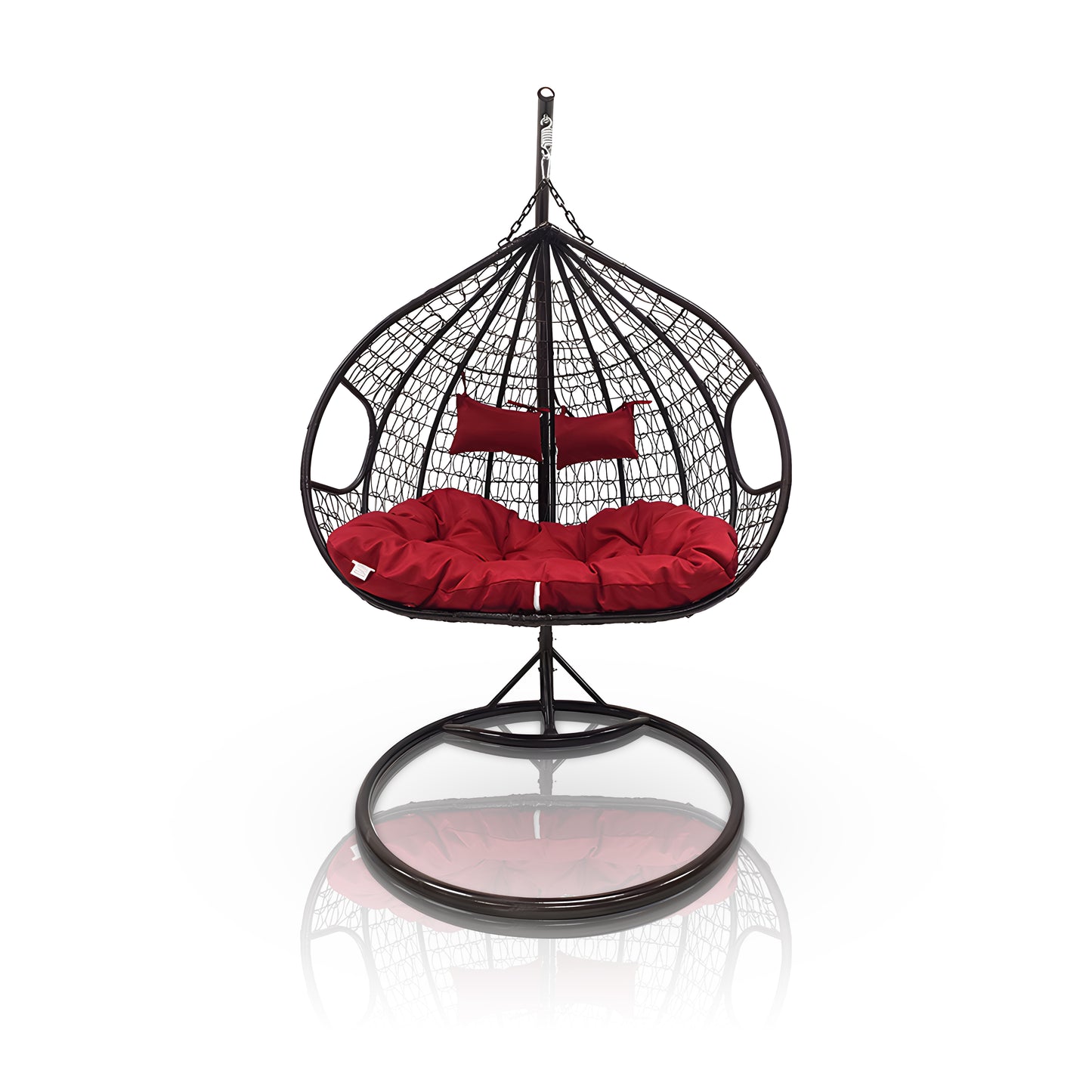 The Soho Outdoor Swing Chair - Black by Landmark Decor features a luxurious egg-shaped design with a black woven rattan frame and plush red cushions, suspended from a sturdy metal stand that subtly reflects on the glossy white surface below.