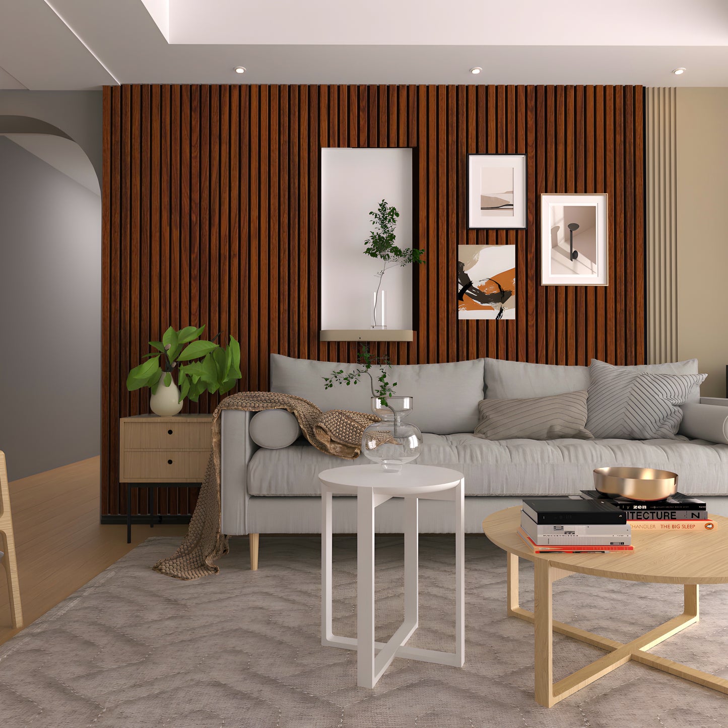 Modern living room with a light gray sofa, Red-Brown Fir Wood Texture WPC Fluted Slat Wall Panel by Landmark Decor, framed art, indoor plants, a round rug, and minimalistic coffee tables with decor.