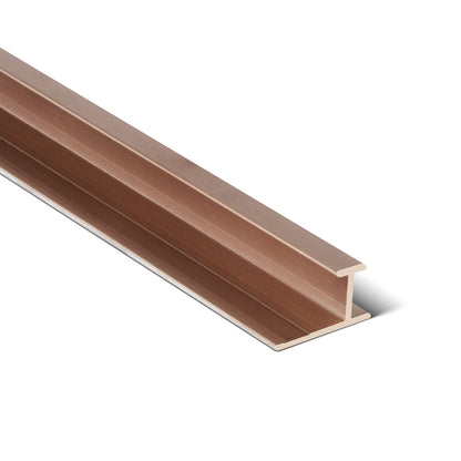 A single Landmark Decor Carbon Sheet Aluminum Middle Corner is displayed against a white background, angled to showcase its length and distinct cross-sectional shape, emphasizing the modern finish preferred for wall panel installations.