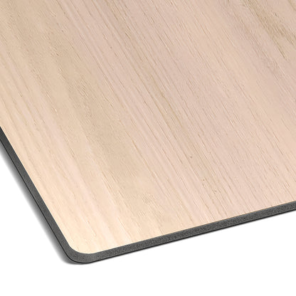 Close-up of Landmark Decor’s Bleached Oak Carbon Sheet, a rectangular board with rounded corners, smooth light wood grain surface, and black edge—perfect for modern wall paneling.