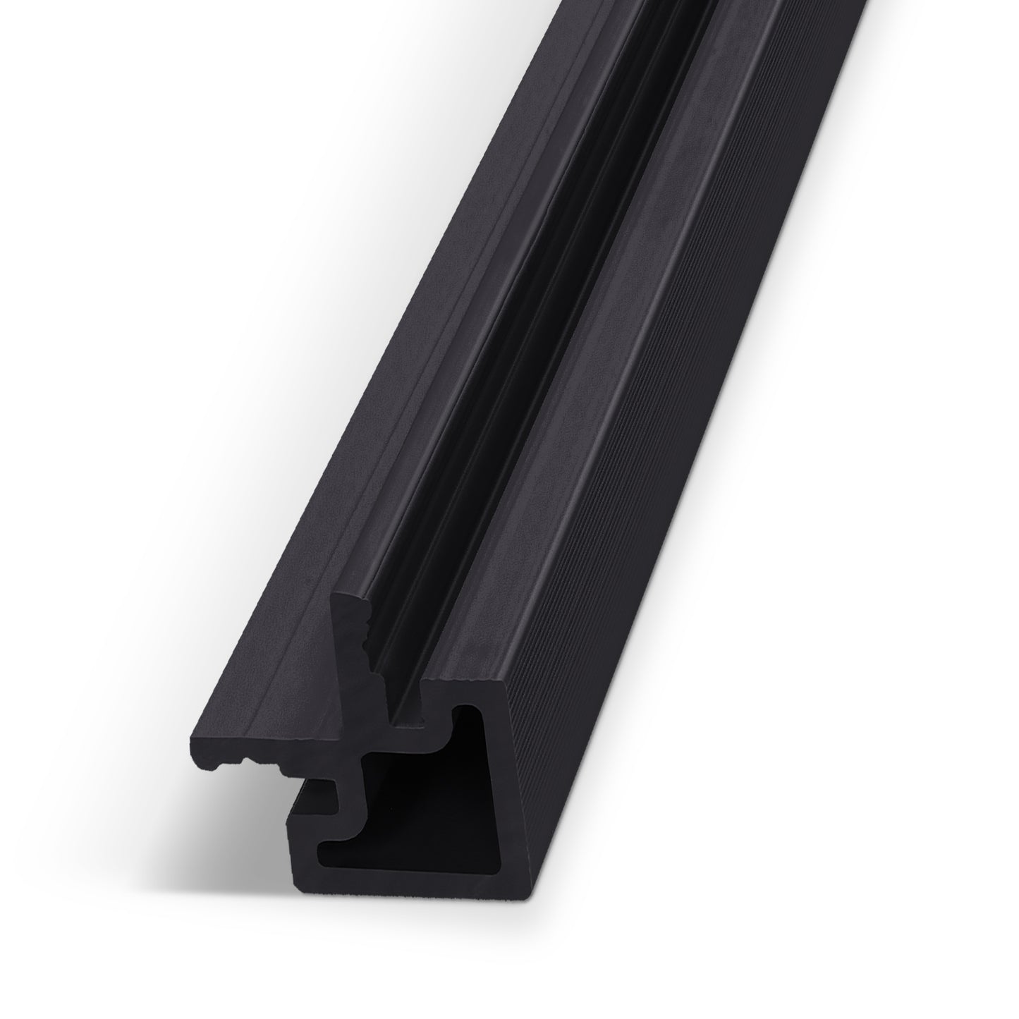 Charcoal Ash Exterior Panel End Piece by Landmark Decor—a black aluminum extrusion profile with a geometric cross-section, featuring grooves and channels, shown diagonally on a white background. Ideal as an end piece or for integration into an exterior wall system.