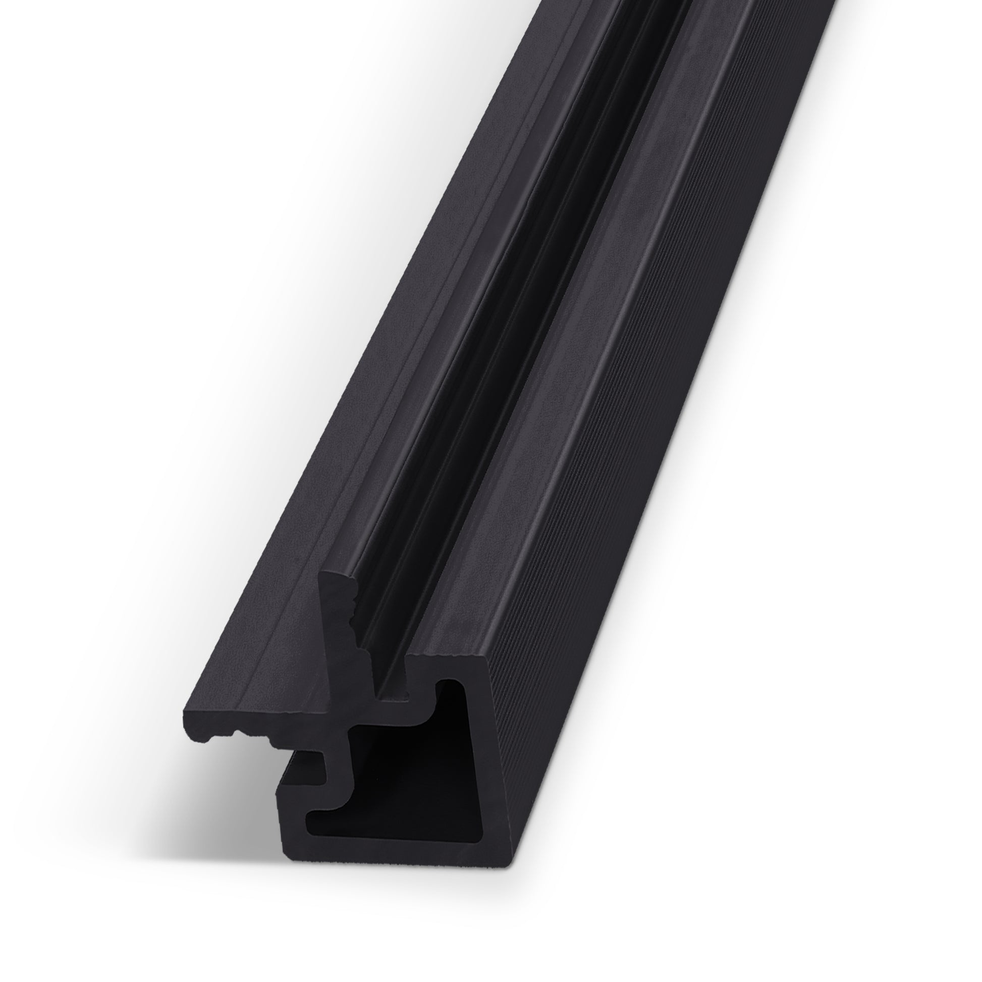 Charcoal Ash Exterior Panel End Piece by Landmark Decor—a black aluminum extrusion profile with a geometric cross-section, featuring grooves and channels, shown diagonally on a white background. Ideal as an end piece or for integration into an exterior wall system.