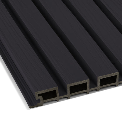 A close-up of the Landmark Decor Charcoal Ash Exterior WPC Panel, a black, grooved rectangular board with hollow channels, perfect for weather-resistant exterior panels or stylish outdoor wall decoration.