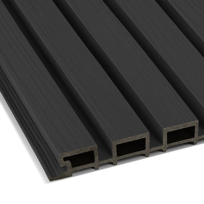 Close-up of Landmark Decor’s Urban Shadow Exterior WPC Panel, a black composite board with wood grain texture and four hollow channels, perfect for weather-resistant outdoor applications.