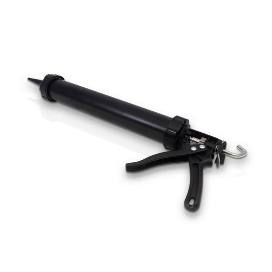 Landmark Decor Glue Gun with a cylindrical tube and trigger handle, ideal for adhesive application during wall panel installation, shown in black on a white background.