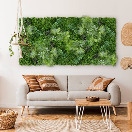 A living room with a light gray sofa, patterned cushions, a white coffee table, a hanging plant, and the Landmark Decor Tropical Green Wall art above the sofa adds a fresh touch of nature.