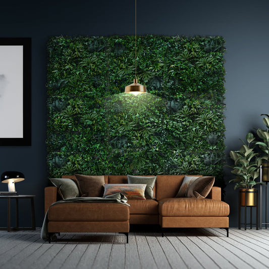 A modern living room featuring Landmark Decor’s Emerald Sanctuary as the focal wall, paired with a brown sectional sofa, decorative pillows, and a pendant light.