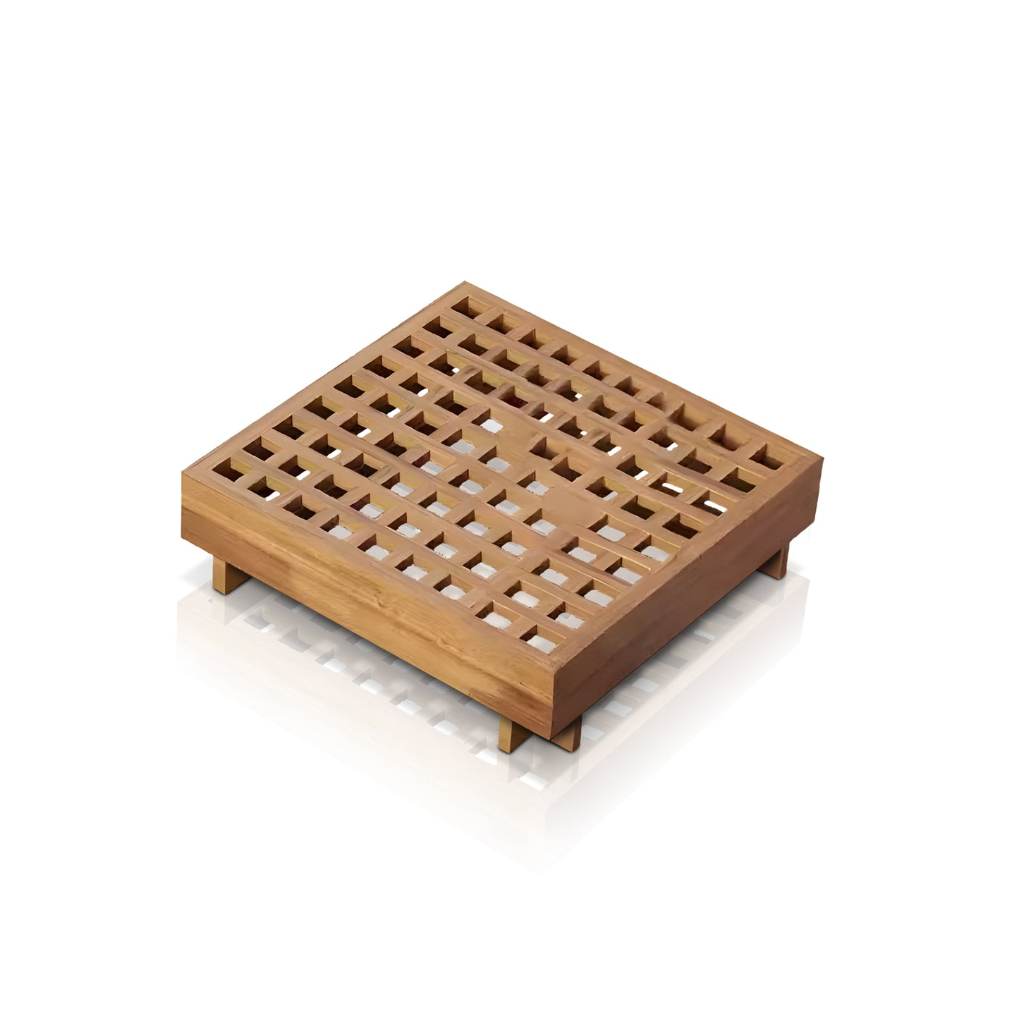 The Square wooden trivet from the Santorini Serenity Collection by Landmark Decor features a grid pattern of square cutouts, with four short legs casting a shadow that echoes the elegance of all-weather frames found on outdoor sofas.