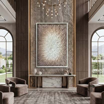 Modern living room with high ceilings, Landmark Decor's Echelon Wall Art as a focal point on a panel accent wall, two brown armchairs, a marble console table, and tall arched windows framing mountain views.