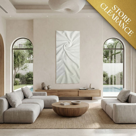 Modern living room featuring neutral furniture, a round wooden coffee table, Landmark Decor’s Nova Wall Art - Small, and arched windows with pool views. A Store Clearance banner appears in the top right corner—ideal for modern decor fans.