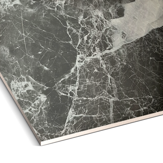 Close-up of the Shadow Mist Marble Durable PVC Wall by Landmark Decor, featuring a dark gray marble design with white veining and a polished finish—perfect for stylish wall panels or elegant marble-effect cladding.
