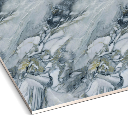 A close-up of Landmark Decor’s Misty River Marble Durable PVC Wall panels, displaying blue-grey and white swirled veins in a marble pattern, viewed from an angled corner.