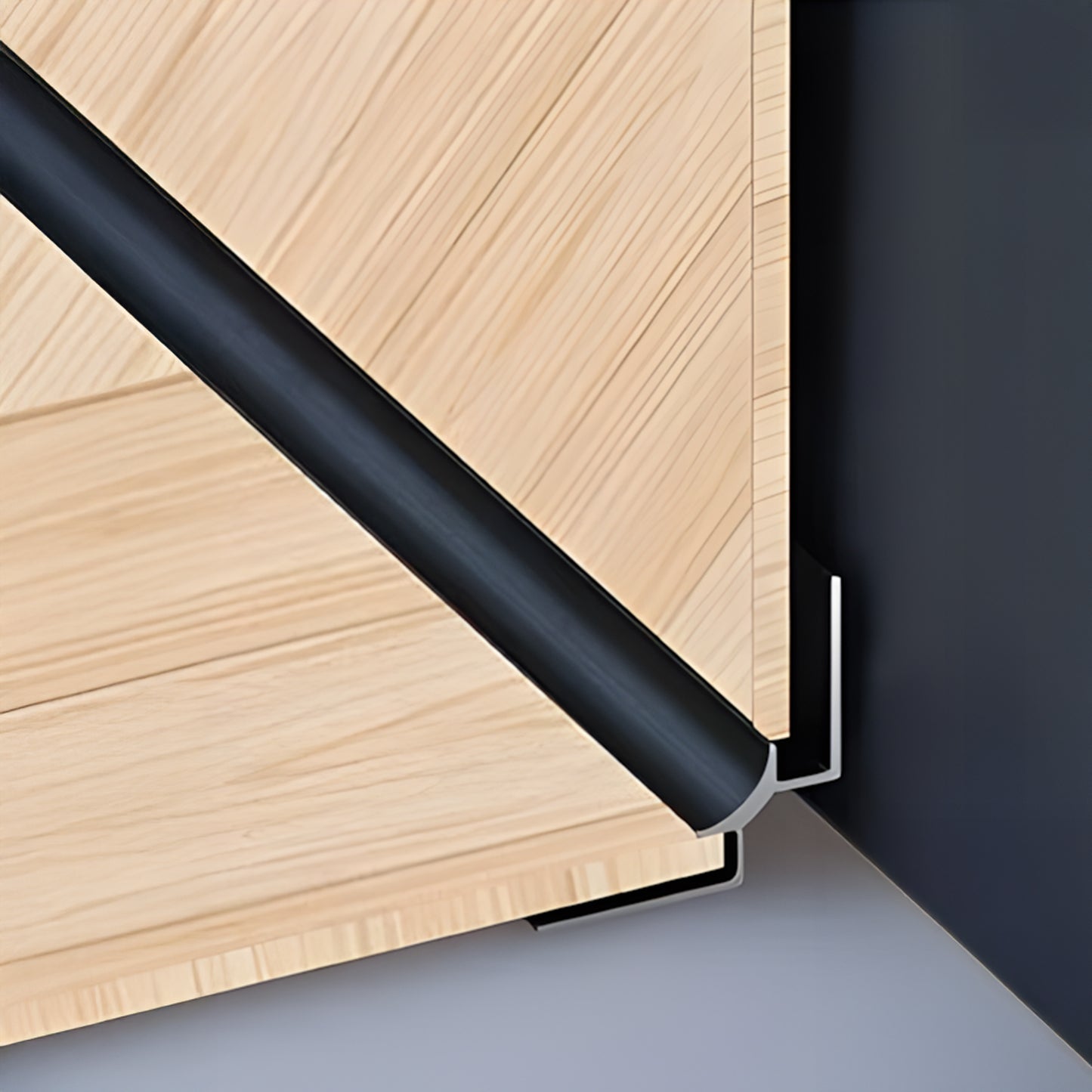 Close-up of a Landmark Decor PVC Wall Inner Corner Strip featuring clean panel edges with diagonal grooves, joined to a black metal frame using an L-shaped bracket—ideal for neat wall panel installations.