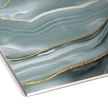 Close-up of Serene Glacier Marble Durable PVC Wall by Landmark Decor, showcasing abstract blue and white waves with metallic gold lines—perfect for pairing with decorative panels or PVC marble wall panels to enhance any interior.