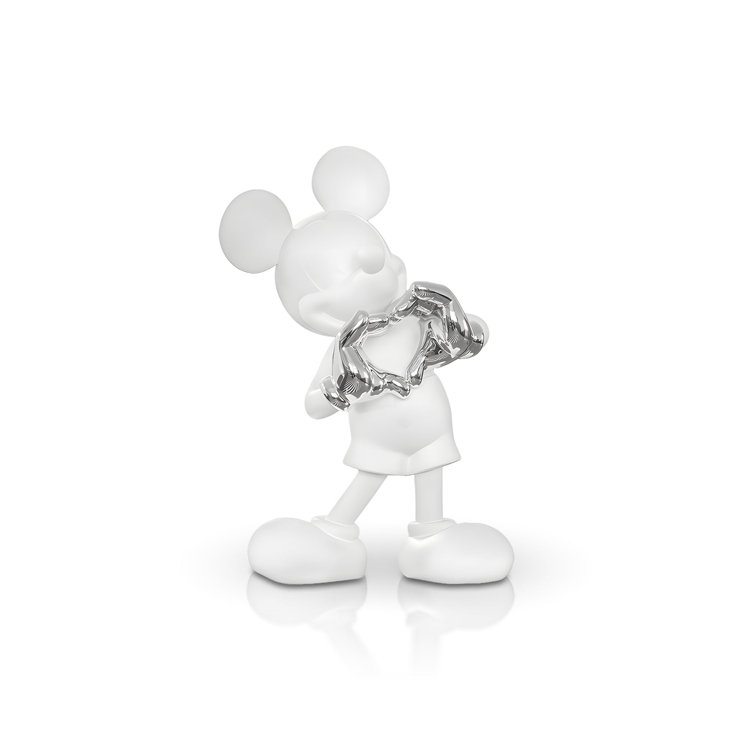 The Heart U - Large by Landmark Decor is a white cartoon mouse figurine holding a shiny silver broken heart, standing on a reflective surface—an artistic sculpture ideal for unique home decor.