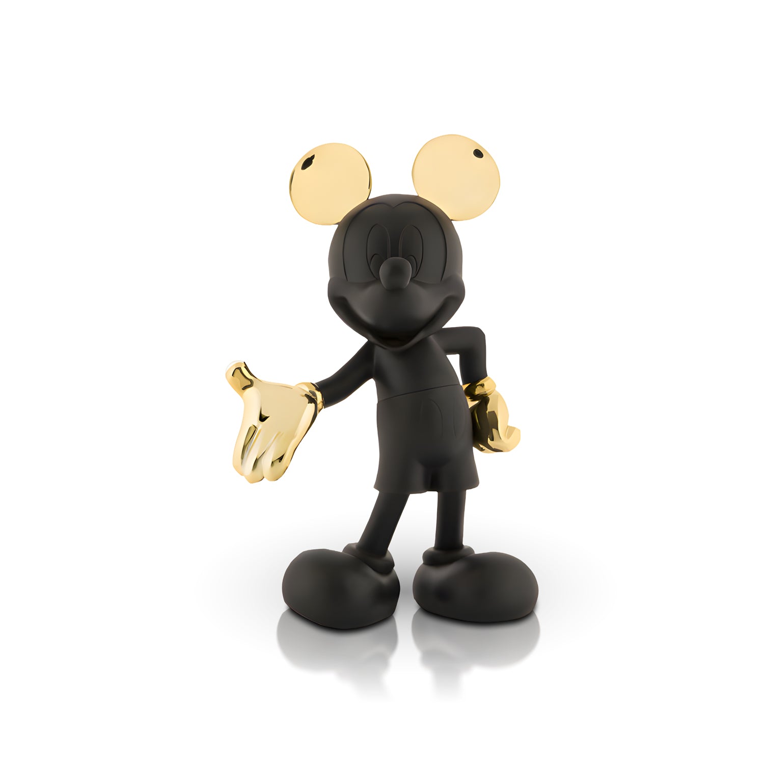 Welcome Invitation - Large by Landmark Decor is a matte black Mickey Mouse figurine with shiny gold ears and gloves, standing on a white surface with one hand extended—an artistic touch of whimsy for your home.
