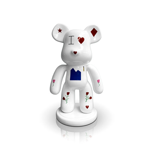 The Violent Bear figurine by Landmark Decor features a white bear on a round base with hearts, roses, diamond shapes, a house graphic, and the phrase "I ♥"—a unique accent to elevate your home decor.