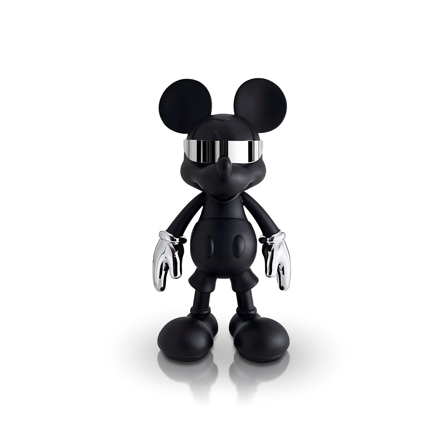 The "Stay Cool" sculpture by Landmark Decor features a black Mickey Mouse-inspired design with chrome gloves and a mirrored visor, making it a striking piece of home decor for any space.