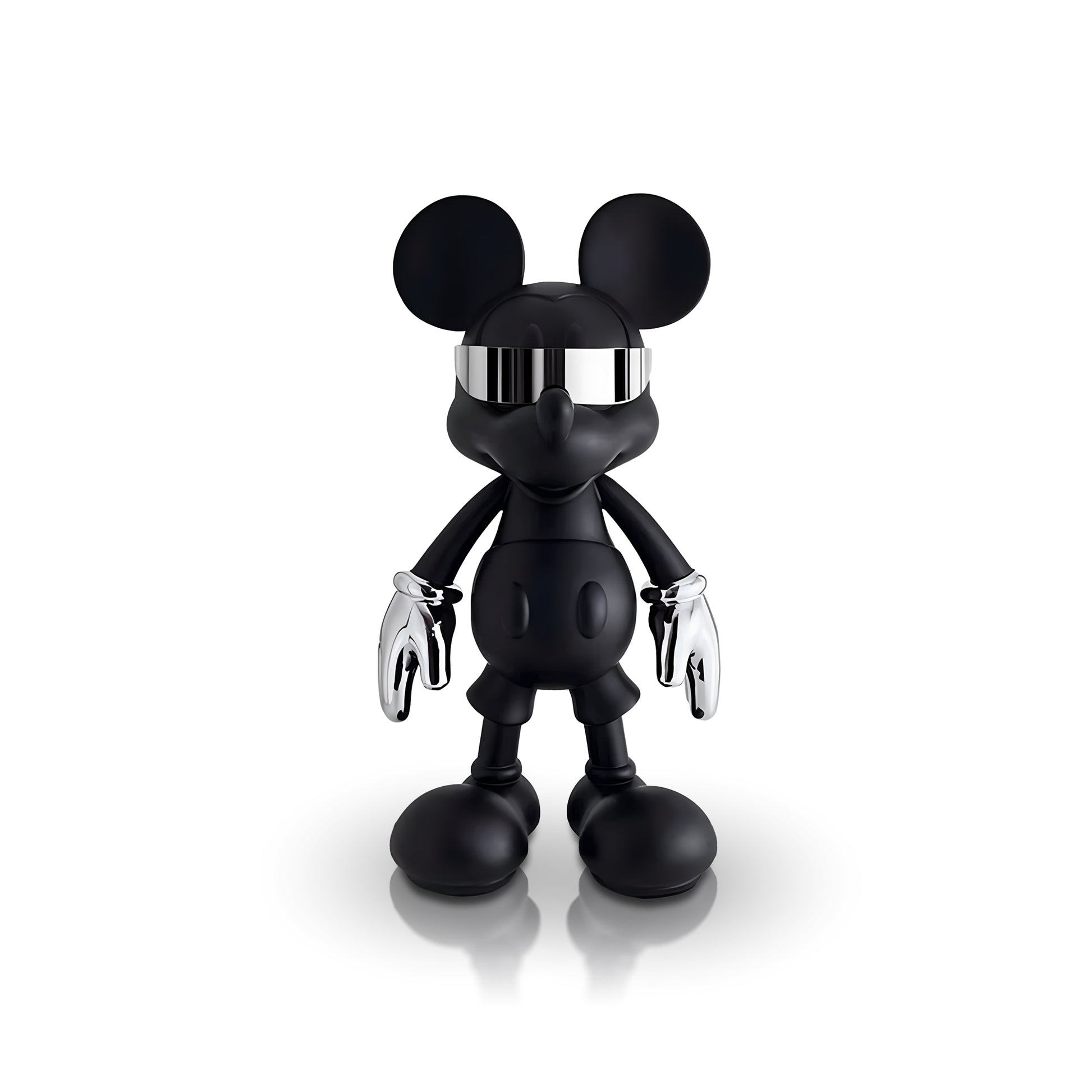 The "Stay Cool" sculpture by Landmark Decor features a black Mickey Mouse-inspired design with chrome gloves and a mirrored visor, making it a striking piece of home decor for any space.