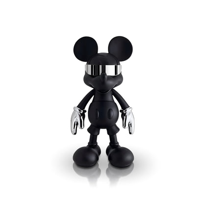 The "Stay Cool" sculpture by Landmark Decor features a black Mickey Mouse-inspired design with chrome gloves and a mirrored visor, making it a striking piece of home decor for any space.