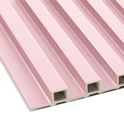 Landmark Decor Pink WPC Fluted Slat Wall Panel—rectangular and hollow with vertical ridges—ideal for accent walls or modern cladding, shown in an angled close-up.