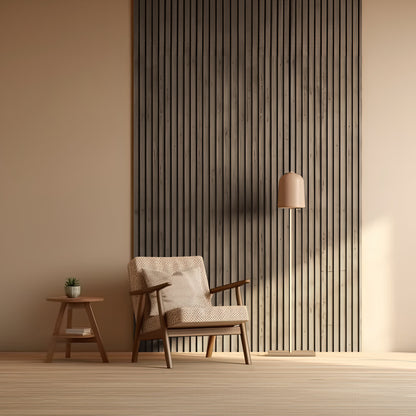A beige armchair with a patterned cushion sits by a small wooden table and lamp, set against Landmark Decor's Cassia Wood Texture WPC Fluted Slat Wall Panel in a minimalist room.