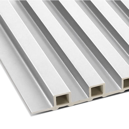 A close-up of Landmark Decor's Paper White WPC Fluted Slat Wall Panel shows its white, rectangular panels with a grooved design—ideal for accent walls or modern cladding.