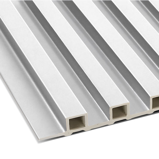 A close-up of Landmark Decor's Paper White WPC Fluted Slat Wall Panel shows its white, rectangular panels with a grooved design—ideal for accent walls or modern cladding.