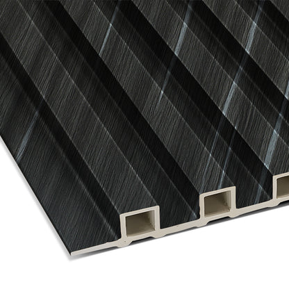 The Landmark Decor Carbon Black with Diagonal Texture WPC Fluted Slat Wall Panel features a black and gray striped surface with four hollow channels, perfect for stylish accent walls or modern interior cladding.