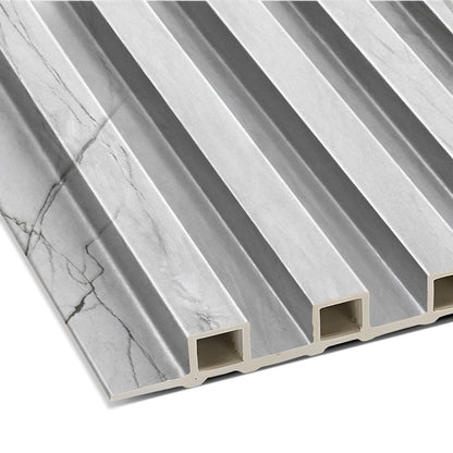 The Landmark Decor Silver Crest Marble WPC Fluted Slat Wall Panel features a rectangular gray and white marble pattern, a ridged surface, and a hollow underside—perfect for stylish accent walls or interior panels.