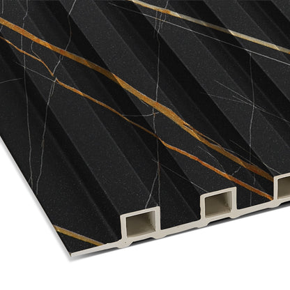 Close-up of the Landmark Decor Molten Nero Vein WPC Fluted Slat Wall Panel—black with gold and white veining, featuring hollow rectangular channels; perfect for accent walls and stylish interior panels.