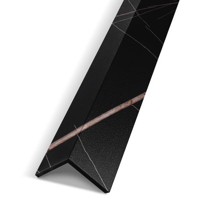 The Landmark Decor Rosso Noir Vein Interior WPC Panel Corner is a black marble-look L-shaped trim with white and brown veining, ideal for finishing wall edges in any wall project.
