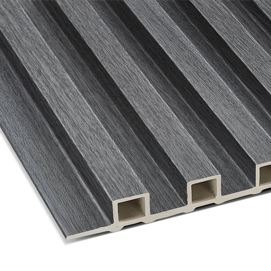 A close-up of the Landmark Decor Space Gray WPC Fluted Slat Wall Panel shows its woodgrain texture and multi-grooved, rectangular design—ideal for stylish accent walls or modern interior paneling.