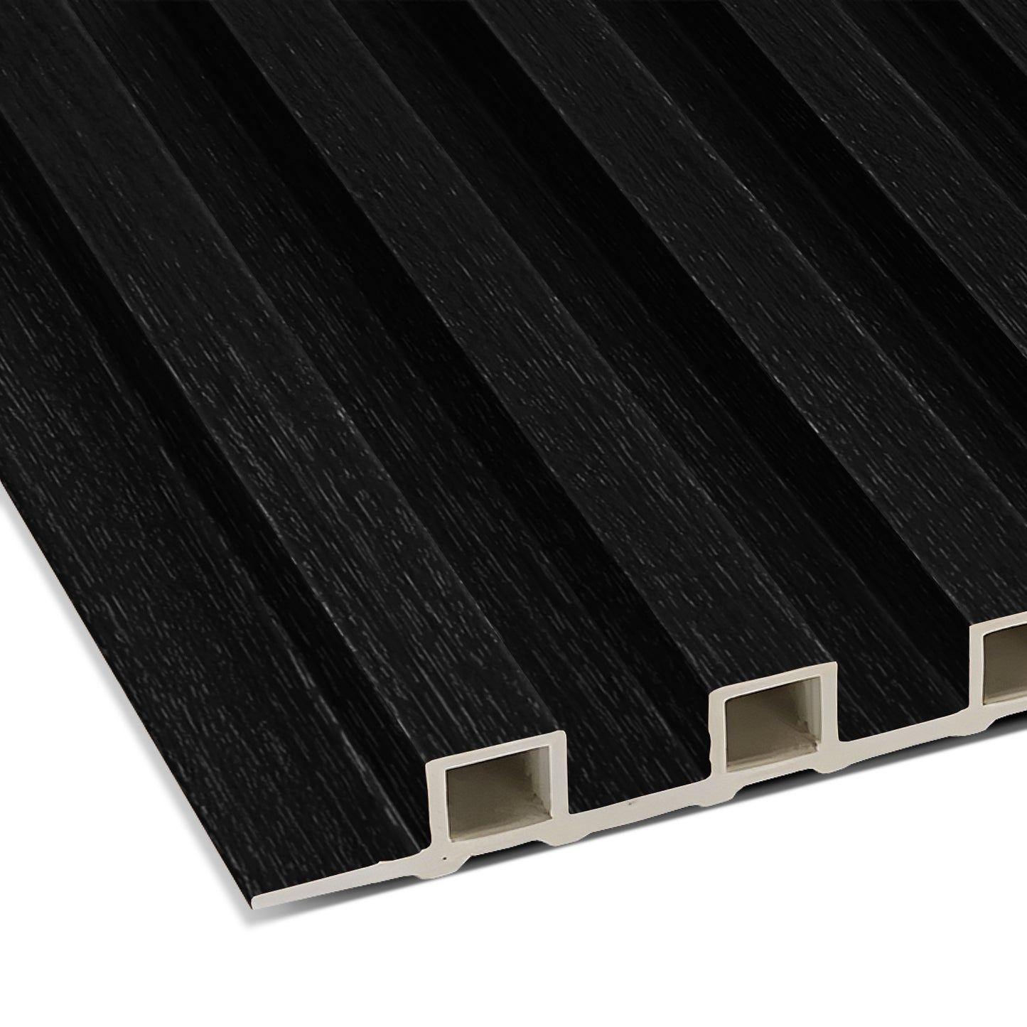 A close-up of the Landmark Decor Black WPC Fluted Slat Wall Panel shows its grooved, rectangular design and white hollow interior—ideal for accent walls or ceiling panels.