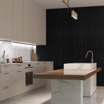 Modern kitchen with white cabinets, marble countertops, a built-in oven, and a large wood-and-marble island, complemented by Landmark Decor's Black WPC Fluted Slat Wall Panels for striking accent walls that add depth and style.